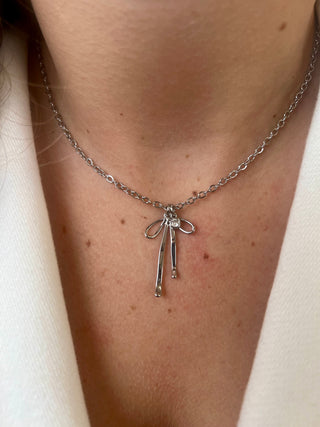 Melted ribbon bow charm necklace: silver