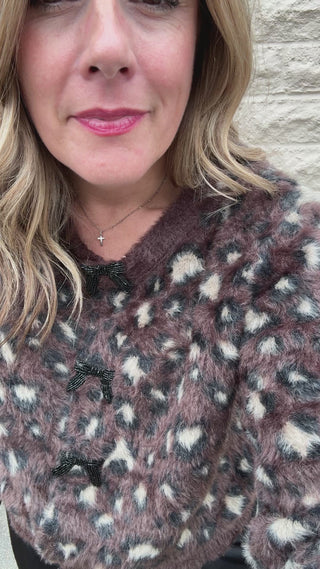 tryon video for animal print sweater