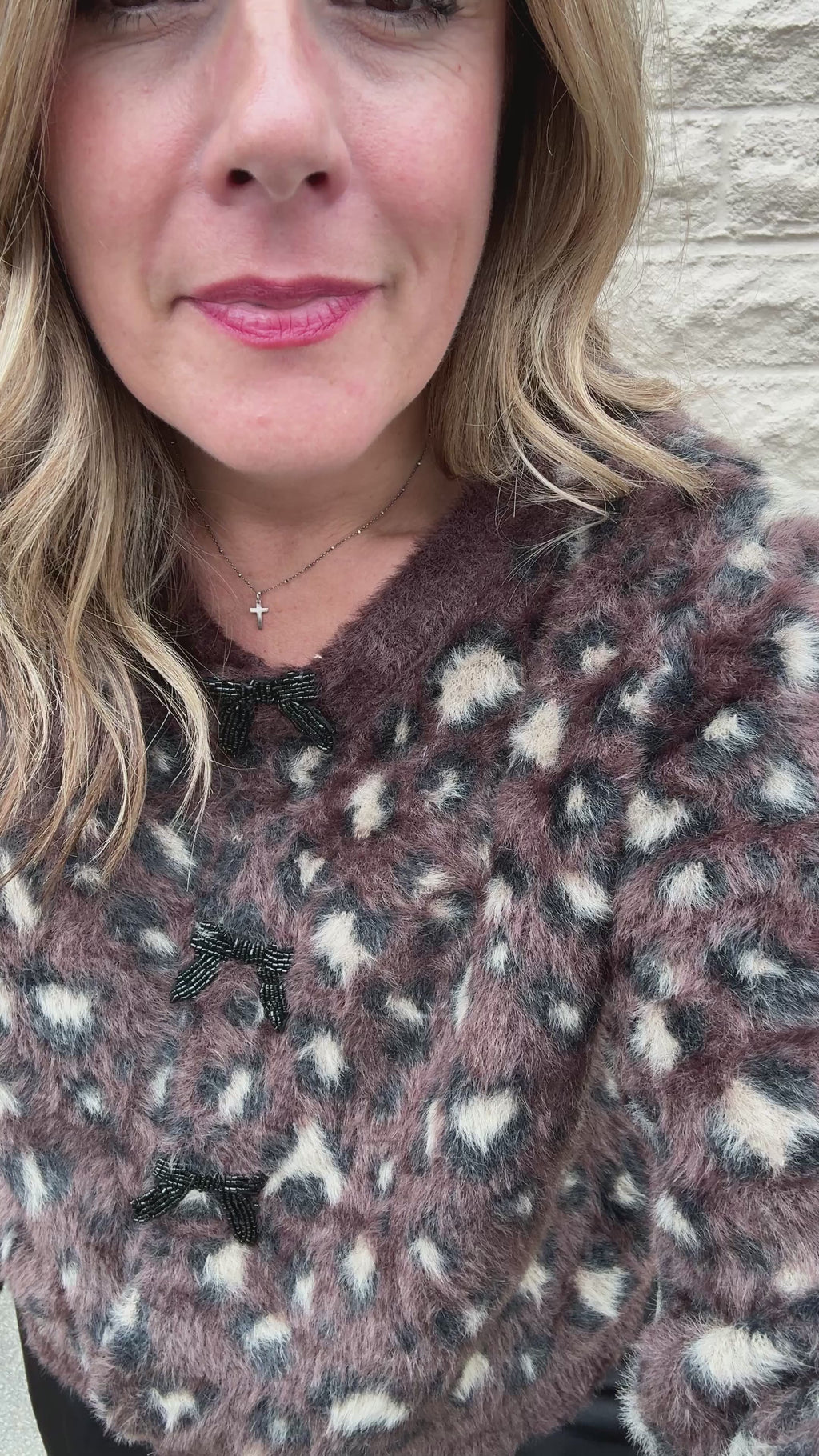 tryon video for animal print sweater